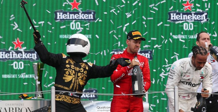 Vettel niet blij met weer zo'n flut-bokaal van Heineken